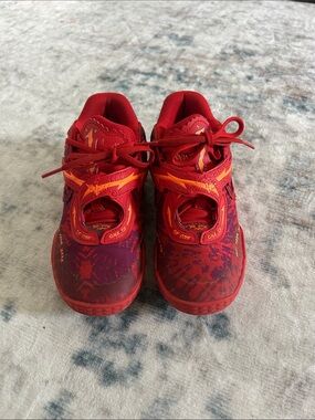 Puma Melo Kids Red Sneakers with Orange Lightning Detail